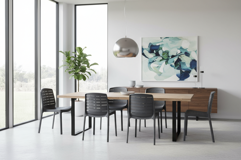 Grey plastic dining chairs in elegant dining room setting - UAE interior design Dubai