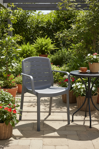 Cedargrain resin outdoor armchair on patio in UAE - Premium weather-resistant furniture for Dubai Abu Dhabi Sharjah homes